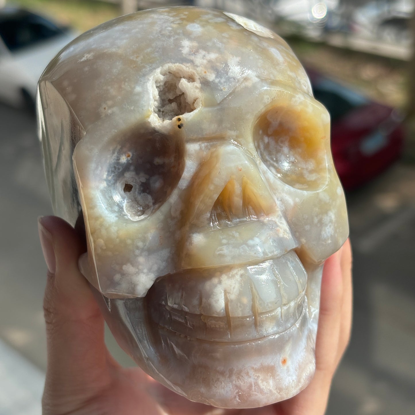 "Hand-Carved Flower Agate Crystal Skull - Unique Natural Stone Sculpture"