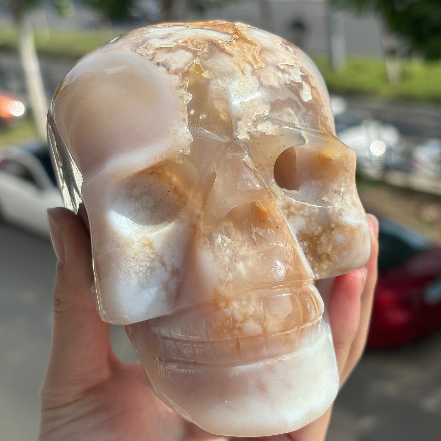 "Hand-Carved Flower Agate Crystal Skull - Unique Natural Stone Sculpture"