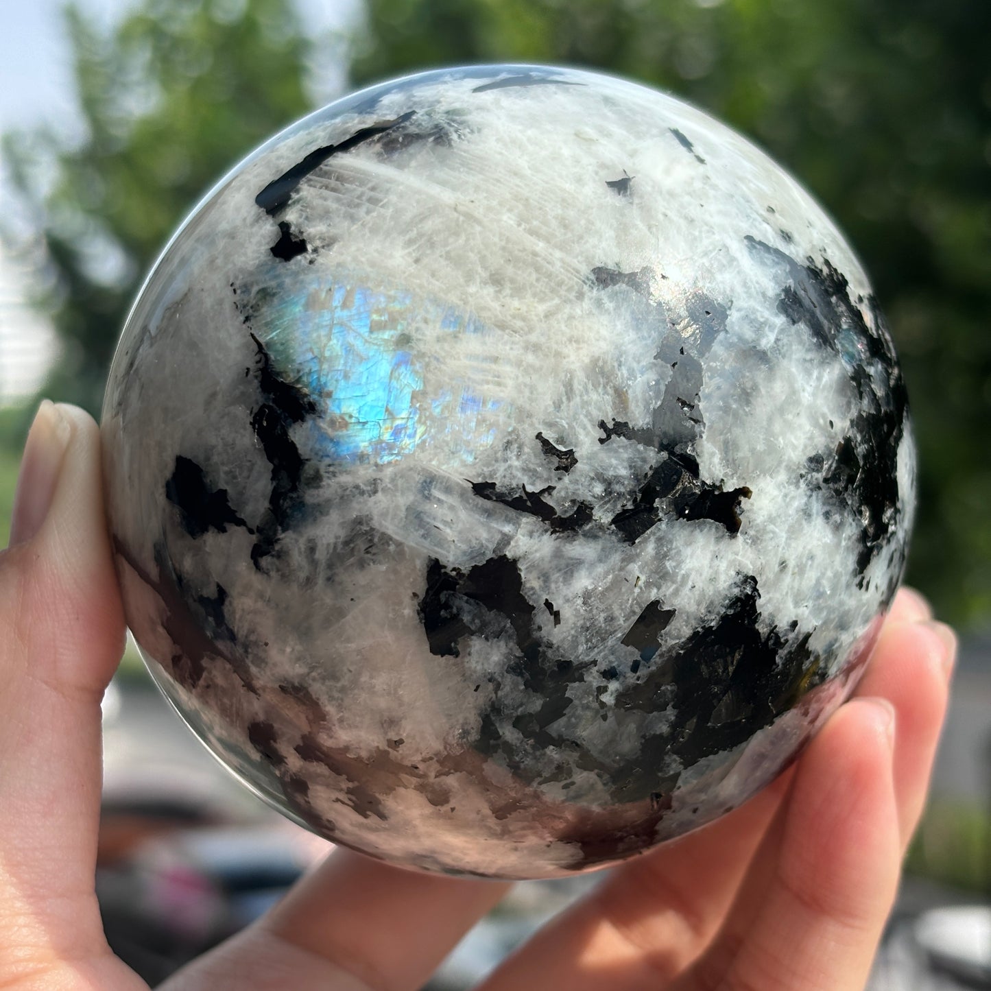 "Enchanted  Moonstone Sphere - Iridescent Glow & Deep Mystique"