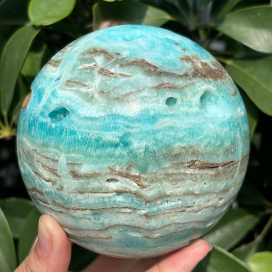 "Hand-carved Hemimorphite spheres - natural stone with unique patterns"