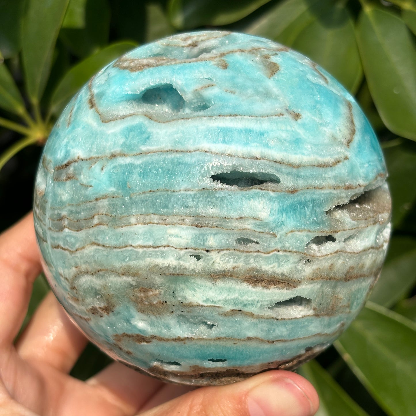 "Hand-carved Hemimorphite spheres - natural stone with unique patterns"