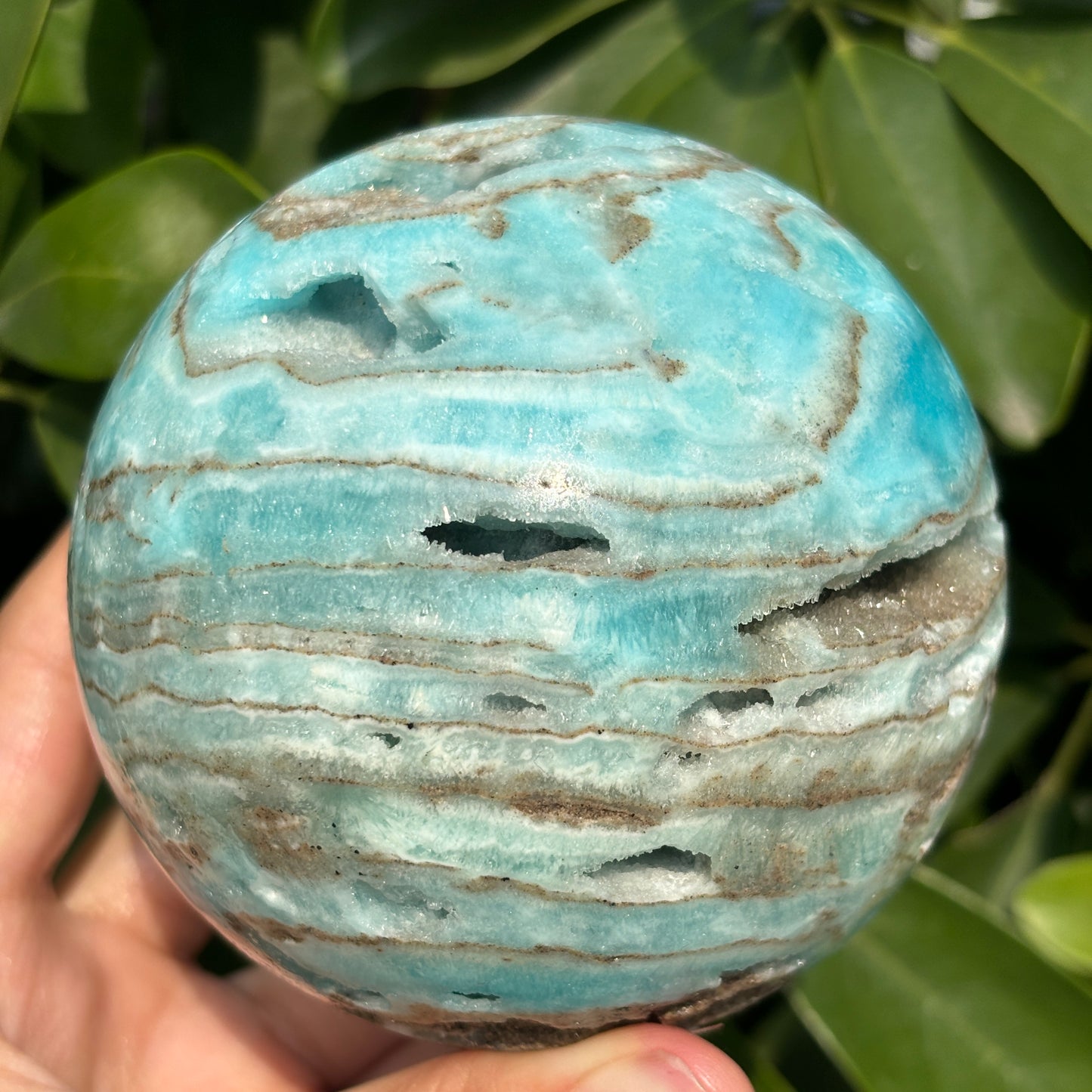 "Hand-carved Hemimorphite spheres - natural stone with unique patterns"