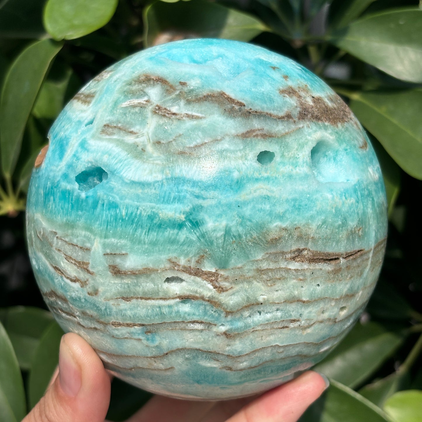"Hand-carved Hemimorphite spheres - natural stone with unique patterns"