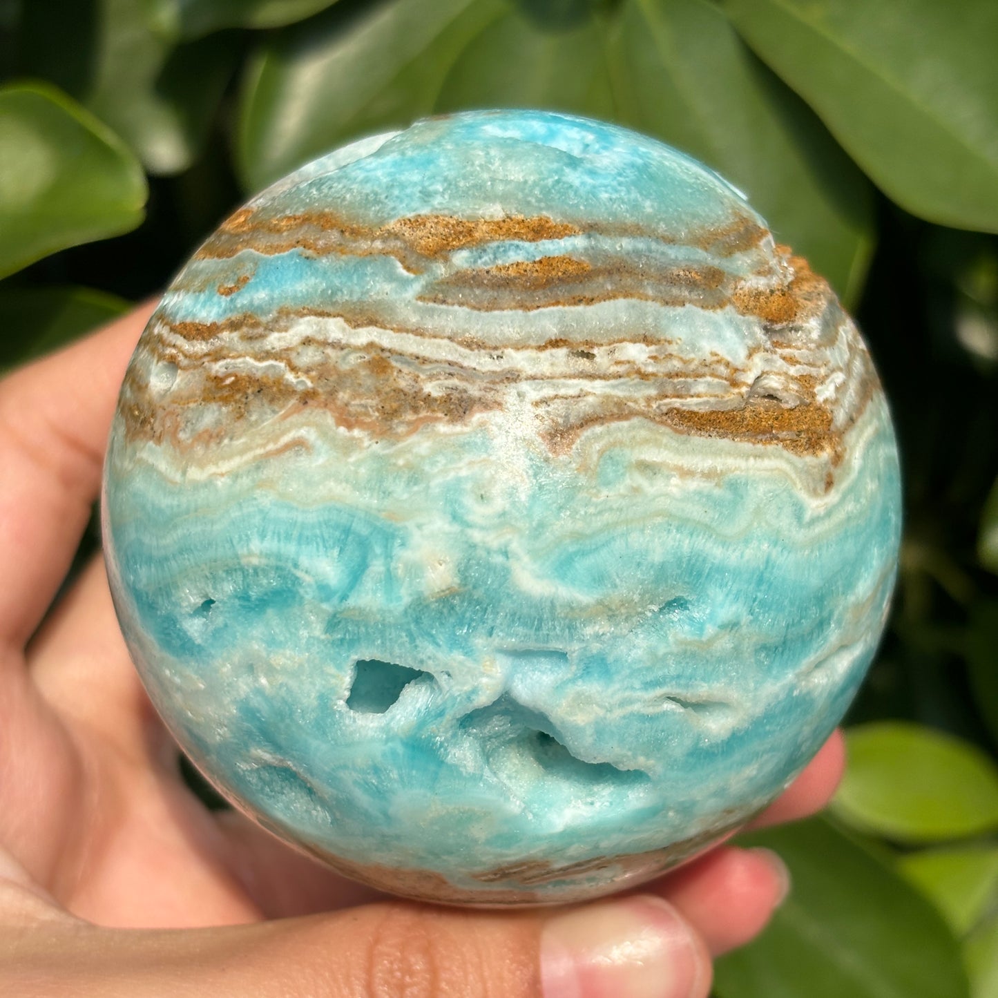 "Hand-carved Hemimorphite spheres - natural stone with unique patterns"