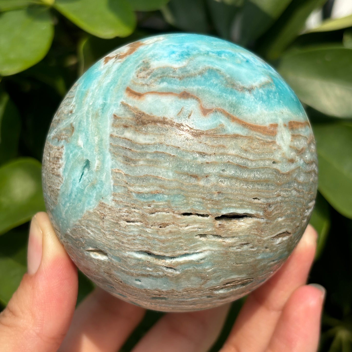 "Hand-carved Hemimorphite spheres - natural stone with unique patterns"