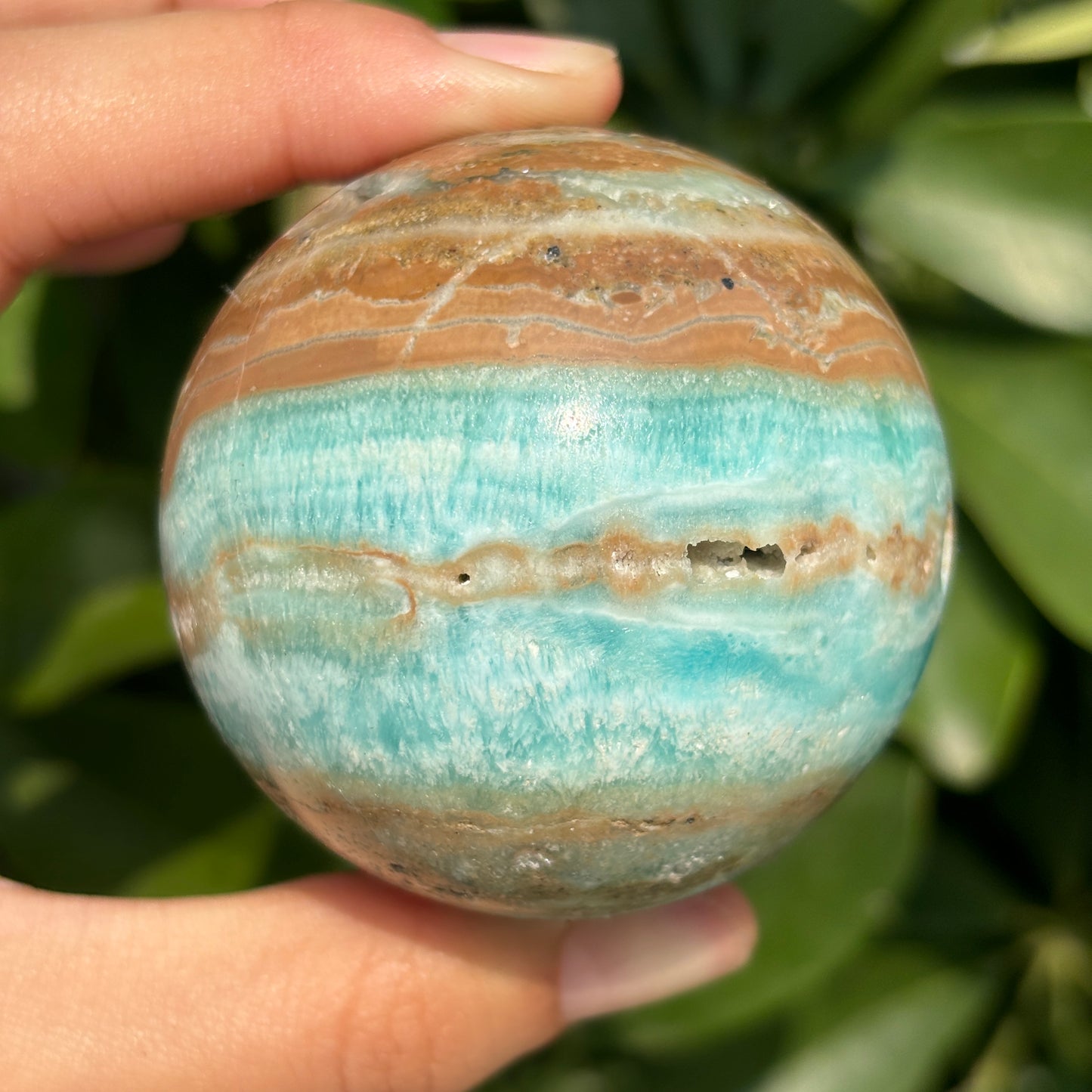 "Hand-carved Hemimorphite spheres - natural stone with unique patterns"
