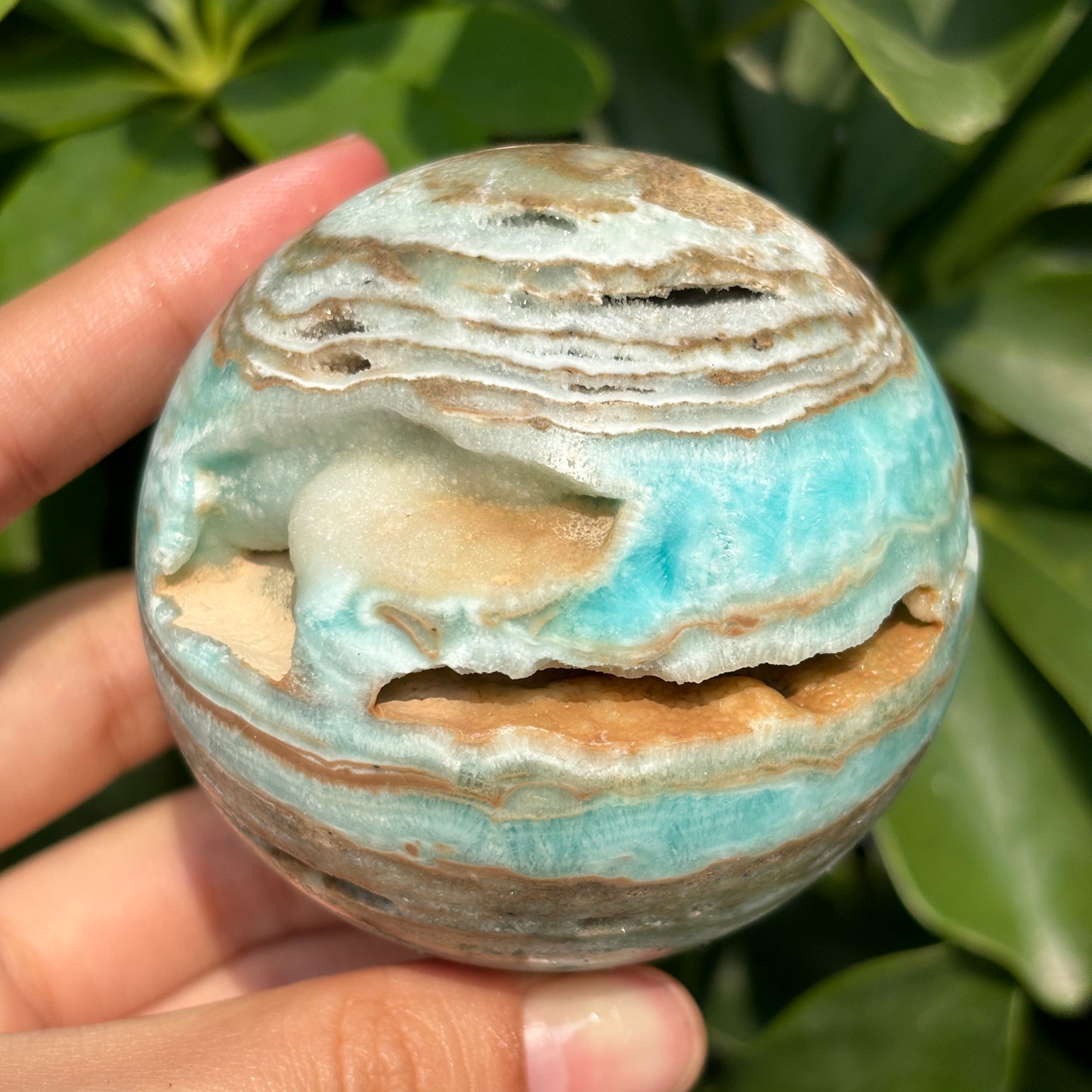 "Hand-carved Hemimorphite spheres - natural stone with unique patterns"
